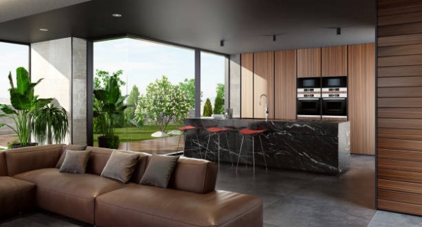 Interiorismo sostenible; vista general de una casa optimizada con una isla de mármol