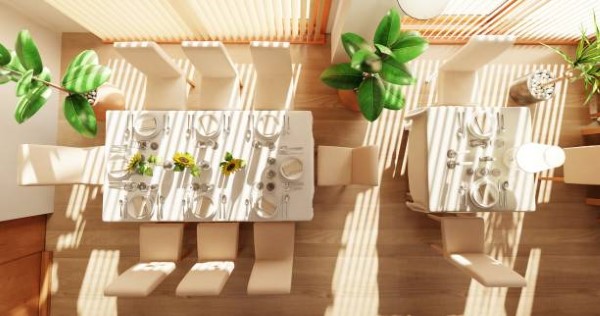 Interiorismo sostenible; vista completa de un espacio de comedor con sala que aplica prácticas sostenibles